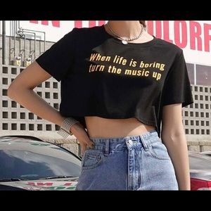 ‘When life is boring turn up the music’ graphic slogan tee.